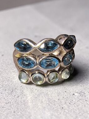 Three Row Mixed Blue Topaz Ring In Sterling Silver
